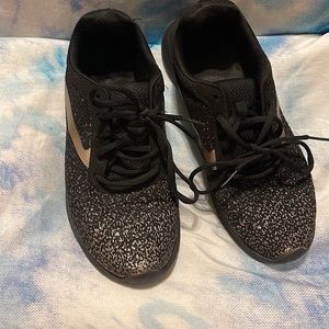 Black and gold shoes